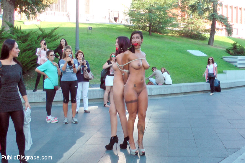 Beautiful girls are tied together during a public humiliation session foto porno #424719455