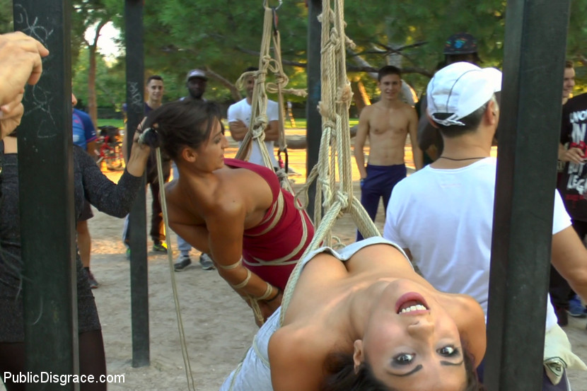 Beautiful girls are tied together during a public humiliation session порно фото #424719458
