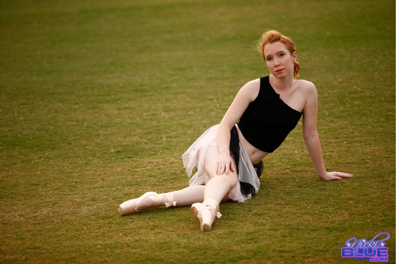 Natural redhead Nicki Blue works on her ballerina moves in an expansive field porn photo #429166246