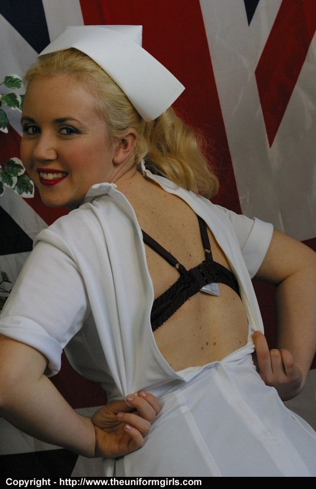 Before displaying tits and twat in nylons, the choosy blonde nurse removes her uniform.