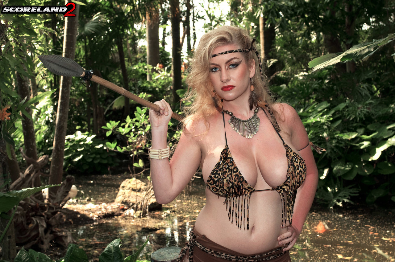 Her male captors suckle the big breasts of blonde Kali West, who is a spear chucker.