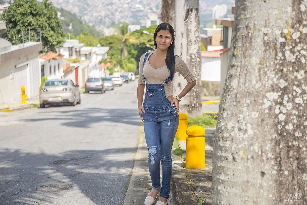 Clothed brunette teen Denisse Gomez shows off her pretty face in jean overalls foto porno #423989204