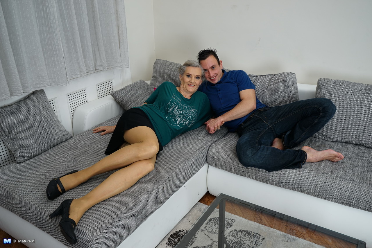 Grey haired granny and her young boy toy get down to fucking after foreplay porn photo #429053947
