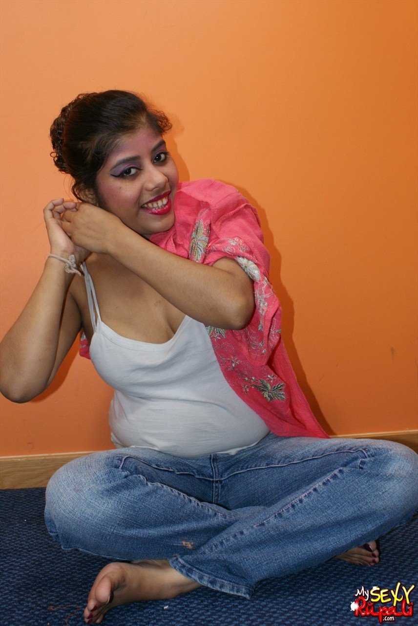 Chubby Indian chick Rupali Bhabhi gets totally naked during solo action photo porno #424820022