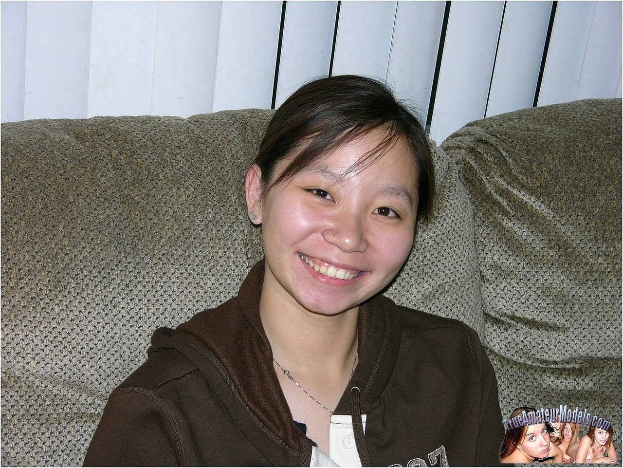 Barely legal Asian girl wears nothing more than a smile while showing her twat foto porno #424574538