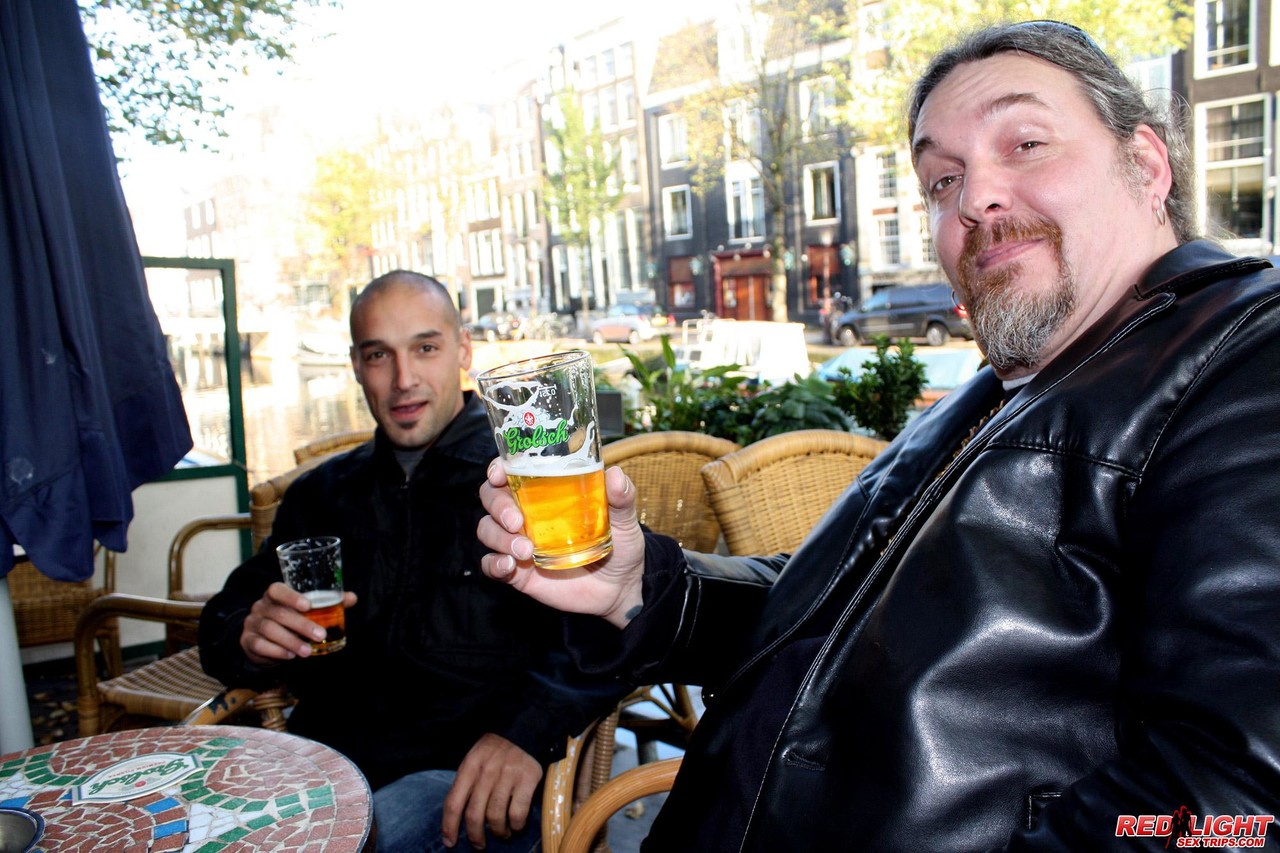 Sex tourists raise a pint before finding a red light hooker to fuck porno fotky #426916711