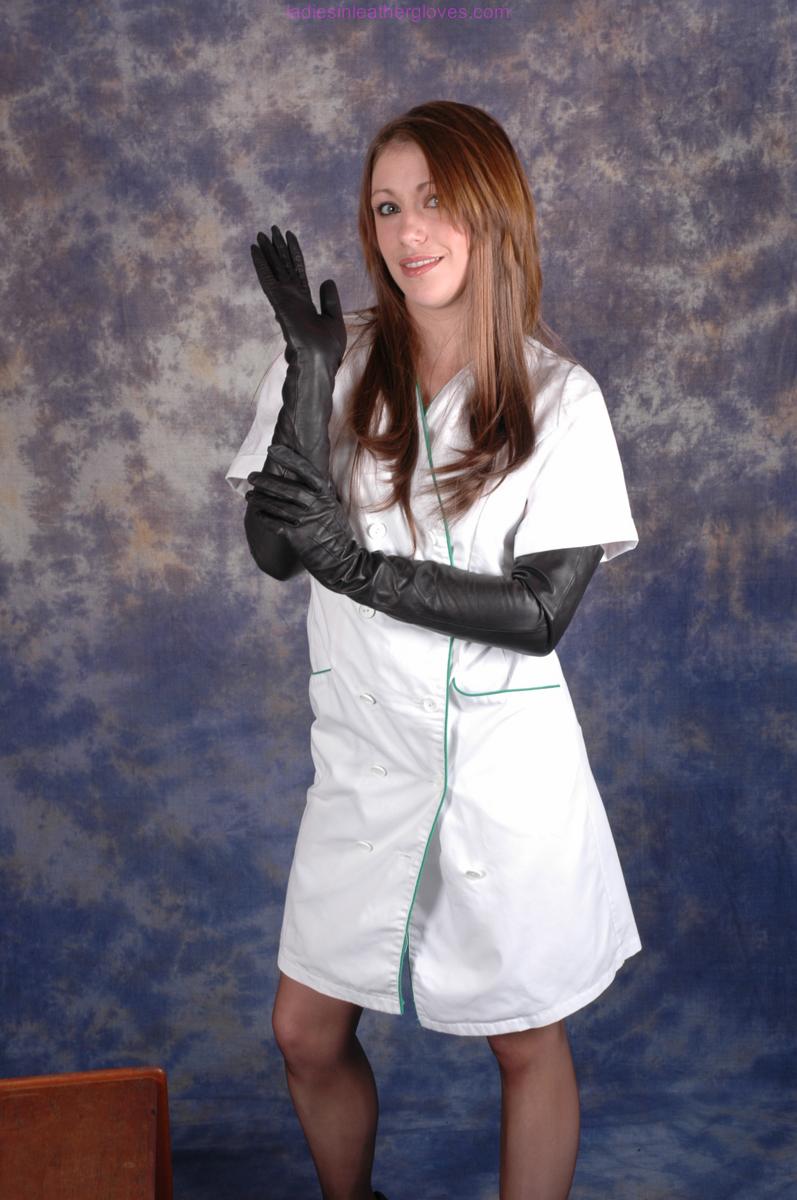Gorgeous Nurse Sophie shows off her long sexy stockinged legs and long black photo porno #426804350
