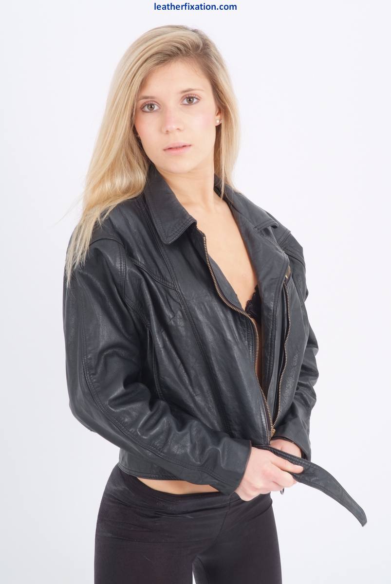 Blond chick unzips her leather jacket in a black bra and leggings photo porno #426774682