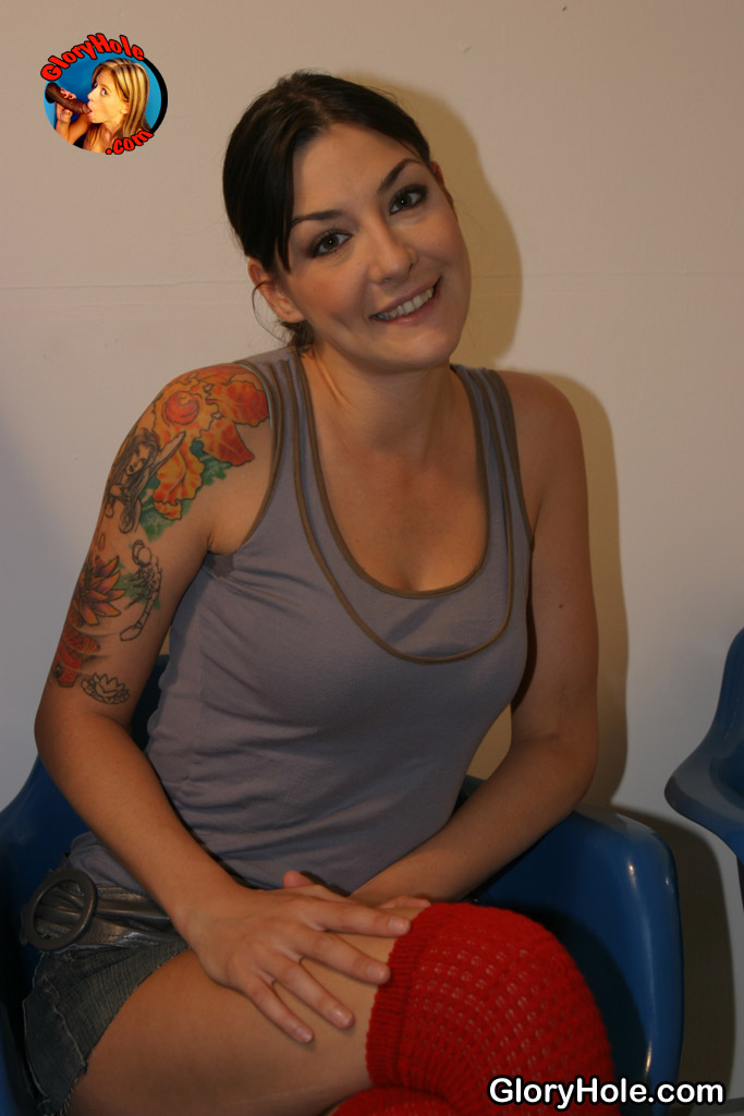Tattooed brunette Lexi Bardot sucks off a BBC at a gloryhole porn photo #425102622