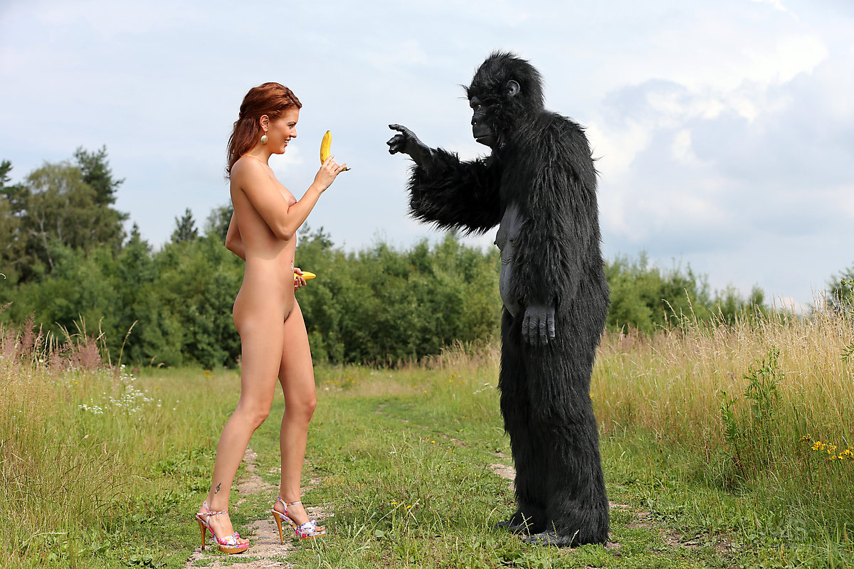Sexy redhead cosplay chick Becca romps nude outdoors in heels with gorilla photo porno #428687020