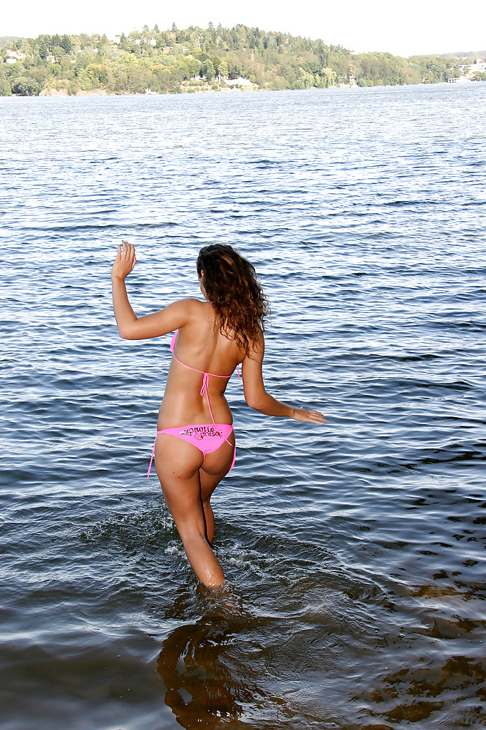 Playful brunette in pink bikini revealing her shapely tits on the beach zdjęcie porno #424882837