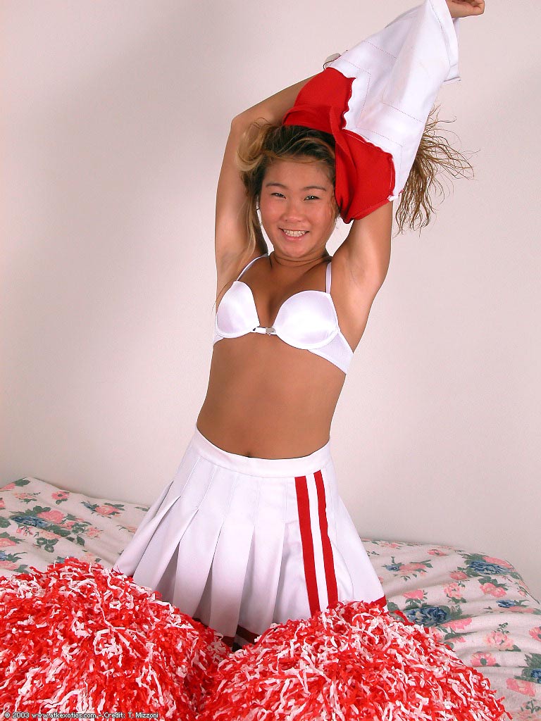 Oriental amateur Annie loosing tiny breasts form bra in cheerleader outfit foto porno #428149171