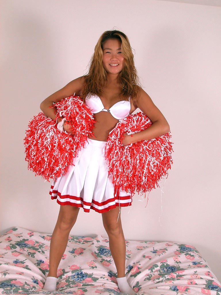 Oriental amateur Annie loosing tiny breasts form bra in cheerleader outfit porno foto #428149172