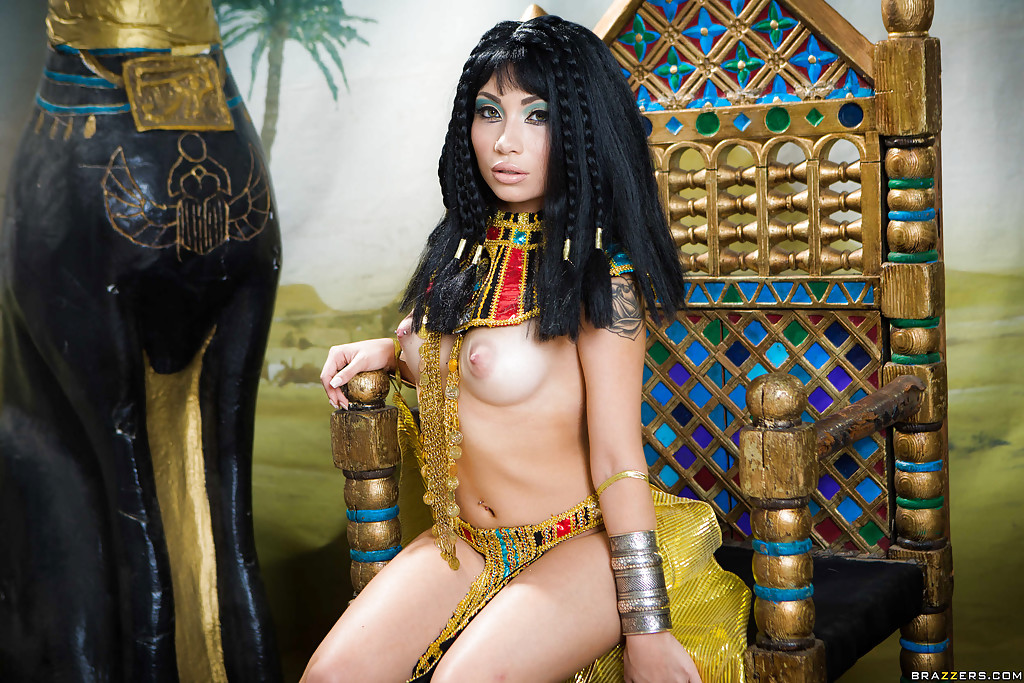 Brunette coed Rina Ellis peeling off Cleopatra themed cosplay outfit porn photo #428204993