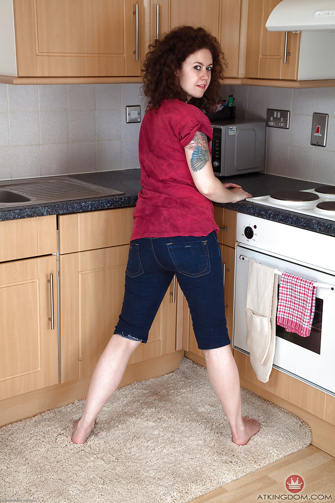 Mature brunette woman Candy revealing hairy snatch while disrobing in kitchen foto porno #428622106