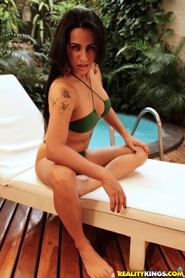 Latina chick Nicolle Bitencourt strips off her bikini next to a swimming pool photo porno #428439025