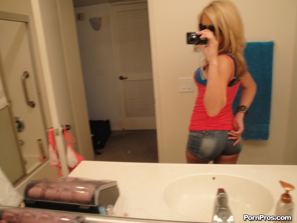 Cute blonde teen Ashley Abott snaps off self shots while undressing in mirror photo porno #425990263