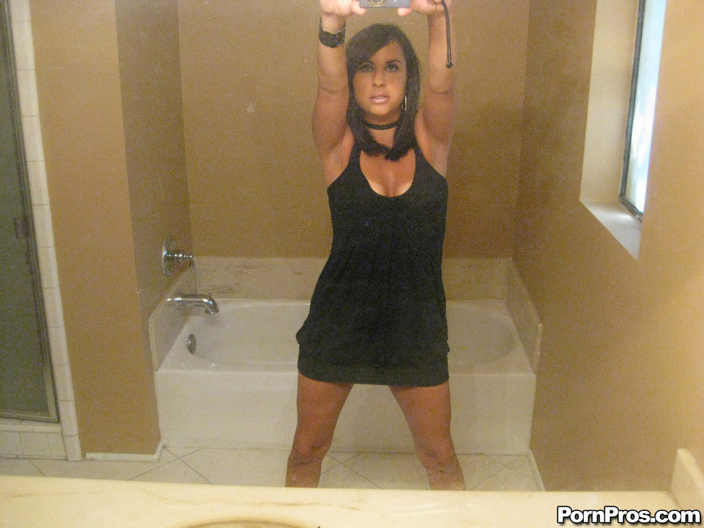 Dark haired ex-gf Sarah Copafeel does a slow striptease in the bathroom porn photo #427587241