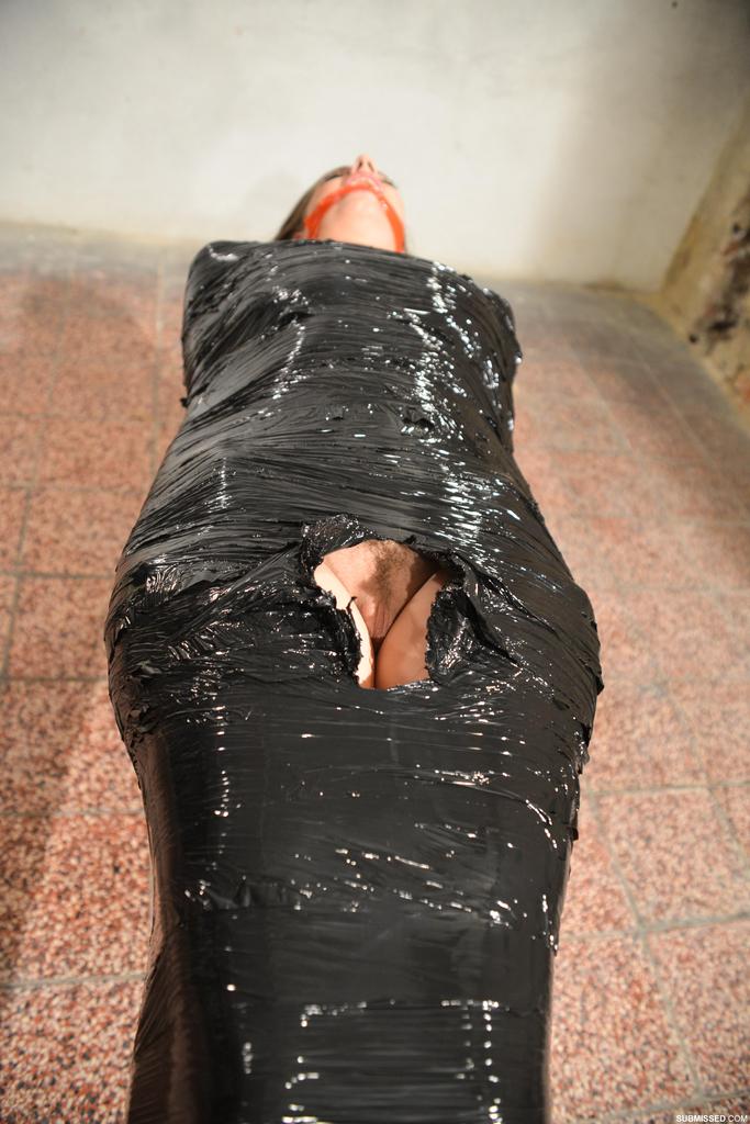 Naked female in high heeled shoes only is mummified in plastic and gagged 포르노 사진 #428306180