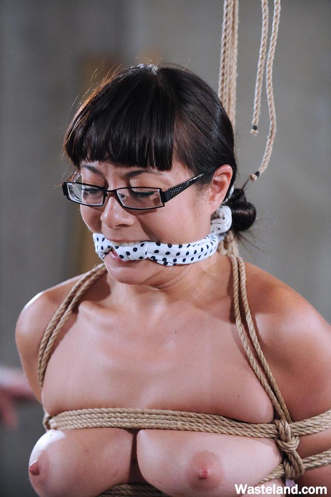 Glasses Clad Asian Female Gets Her Clit Vibrated In A Shibari Bondage Session