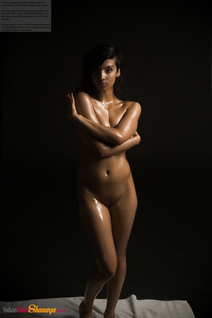 Naked Indian female exposes a single breast while modeling in the dark photo porno #425164292