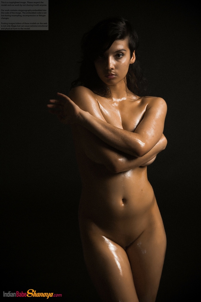 Naked Indian female exposes a single breast while modeling in the dark porno foto #425164295