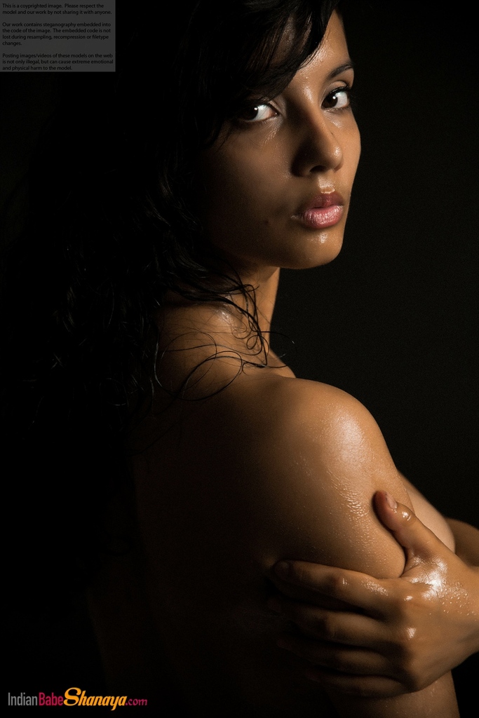 Naked Indian female exposes a single breast while modeling in the dark porn photo #425164306