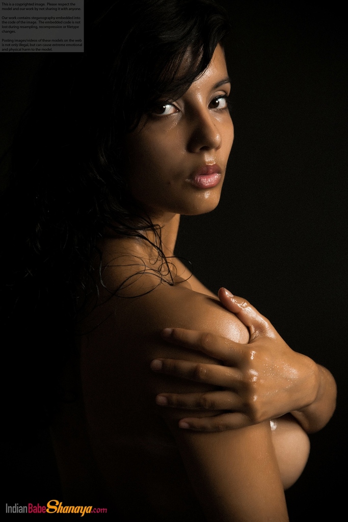 Naked Indian female exposes a single breast while modeling in the dark porn photo #425164310