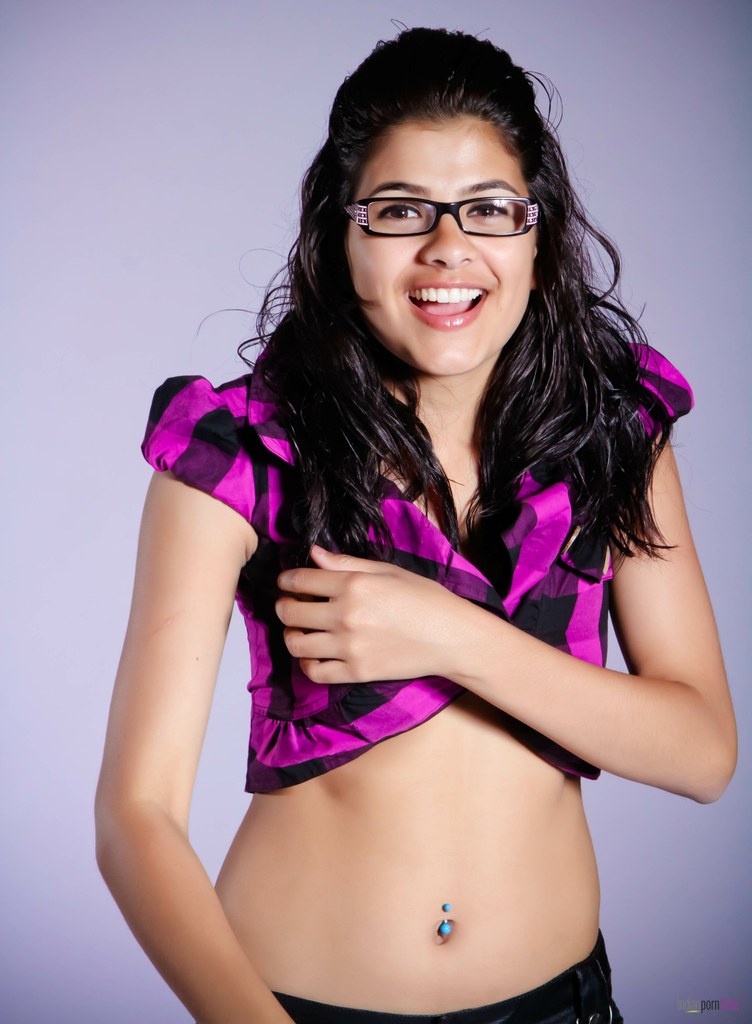 Nerdy Indian girl covers her naked breasts with her hands in a thong -  PornPics.com