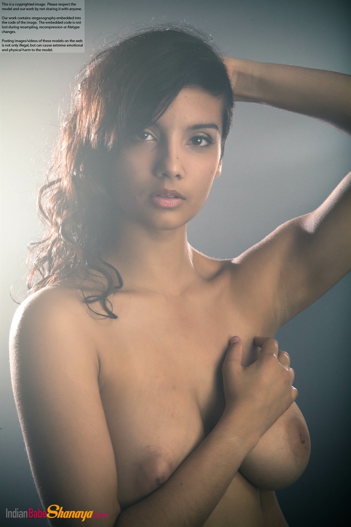 Beautiful Desi female removes her dress to expose her big natural boobs porn photo #423908702