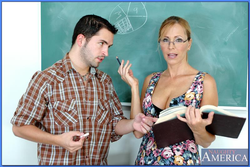 Mature teacher in glasses Nicole Moore pleasuring cock with her boobs foto porno #423874464