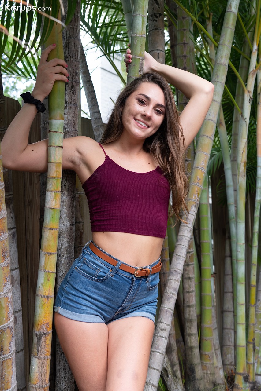 Cute brunette Mackenzie Mace slowly loses her clothes and poses outdoors porno foto #424491027
