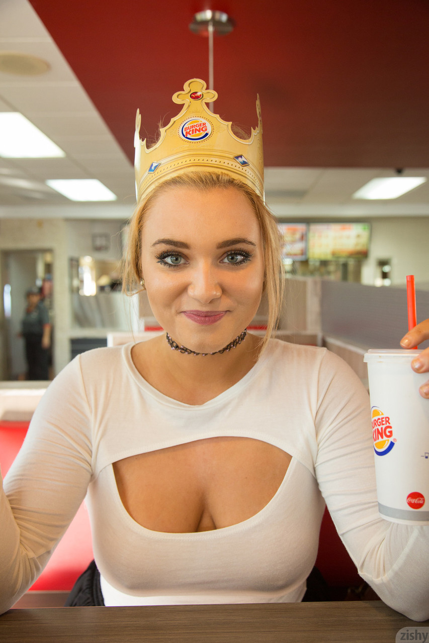 Naughty teen Gwen Stanberg licks her big boobs at the Burger King restaurant porn photo #423890342