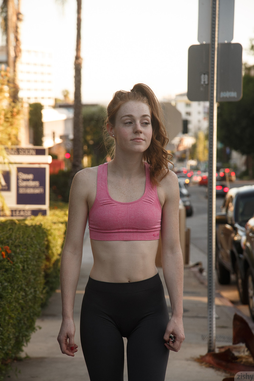 Teenage athlete Julie Wheeler working out in a sexy pink top and gym tights ポルノ写真 #423991163