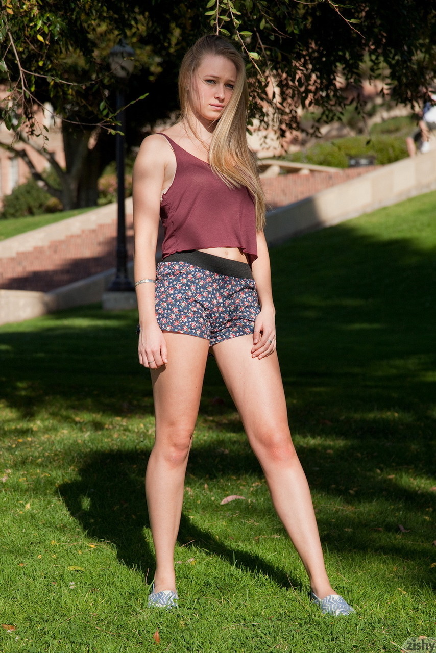 Petite blonde babe Kerstin Dorsia showing her sexy long legs outdoors photo porno #427044222