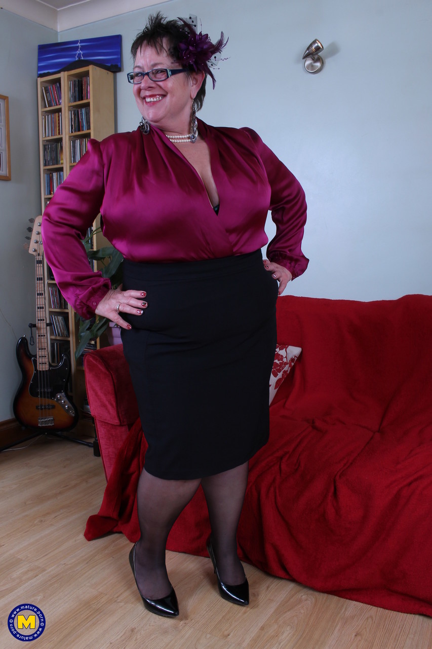 The short-haired BBW Honey is unleashing her massive breasts and showing off her mature snatching.