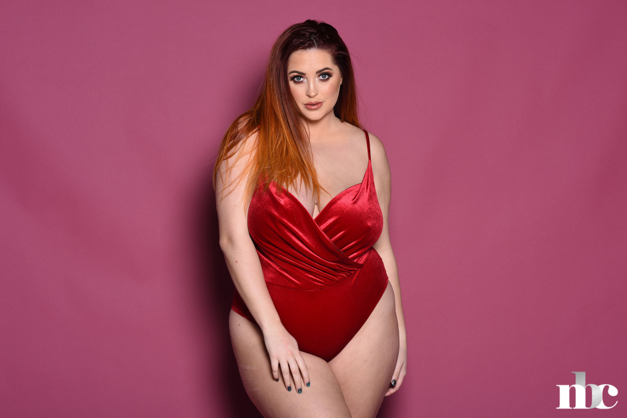 The lovely British fat woman, Lucy Vixen, displays her beautiful natural breasts.