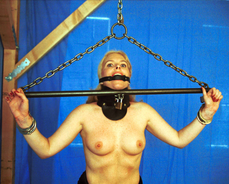 Paige, a submissive prostitute, is bound and humiliated during a bondage session.