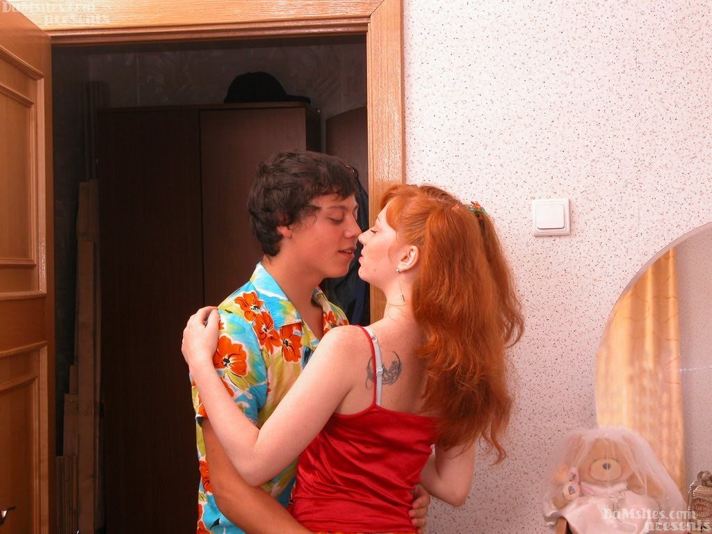 Redhead European teen Flora deepthroats and rides dick while being filmed photo porno #427978925
