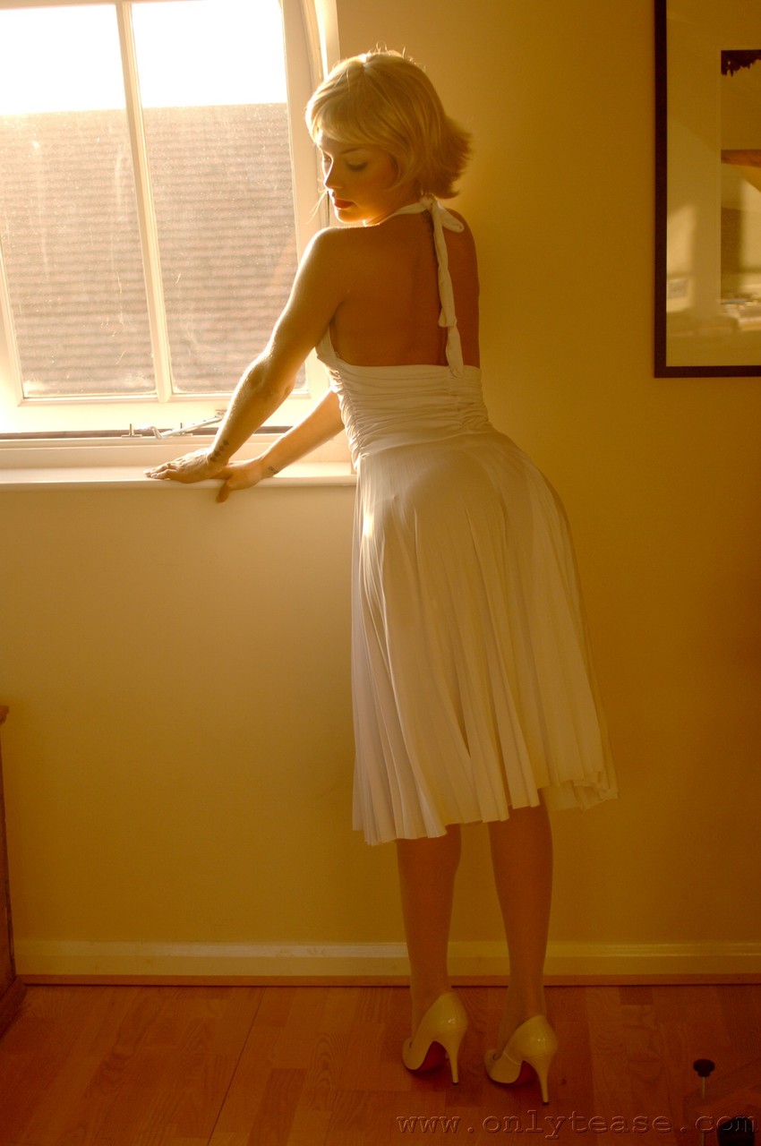 British MILF in a white dress Natasha Marley flashes her panties and stockings porn photo #428922731