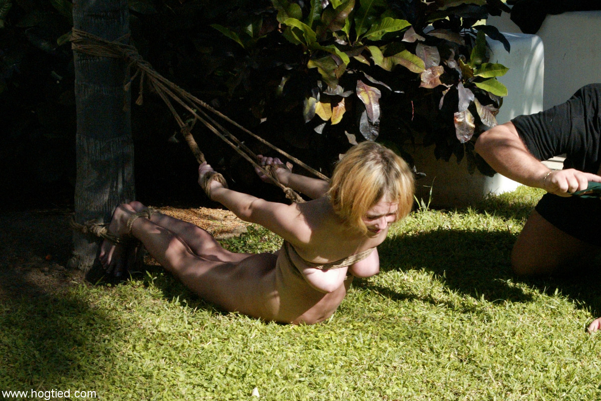 Submissive blonde with big tits gets bound under a tree and tortured porn photo #424966667