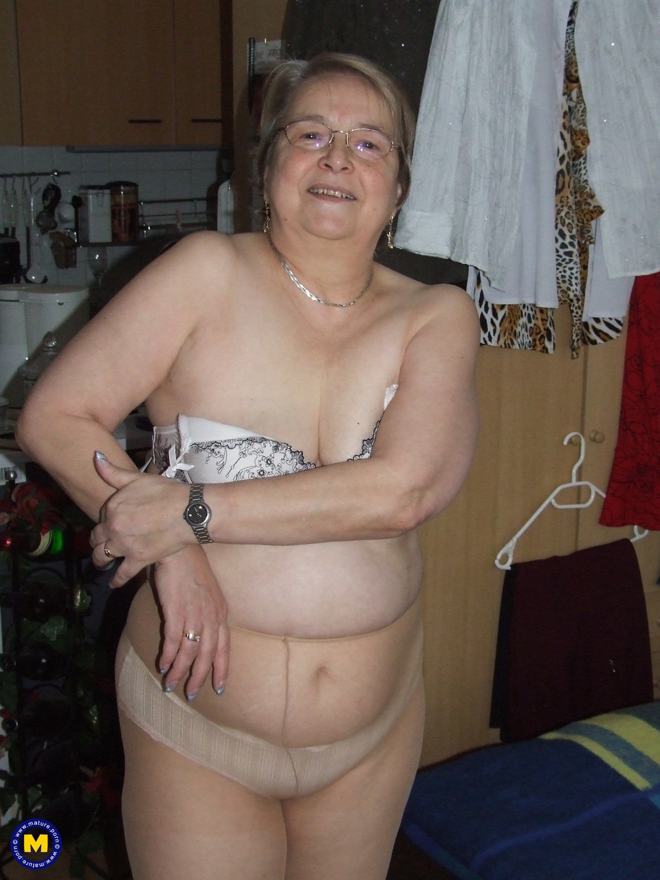 Fat European granny Sybille stripping off her clothes and skin tone tights porn photo #423867231