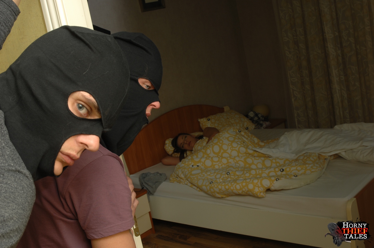 Brunette amateur Masha gets banged by two masked burglars on her bed porn photo #428788599