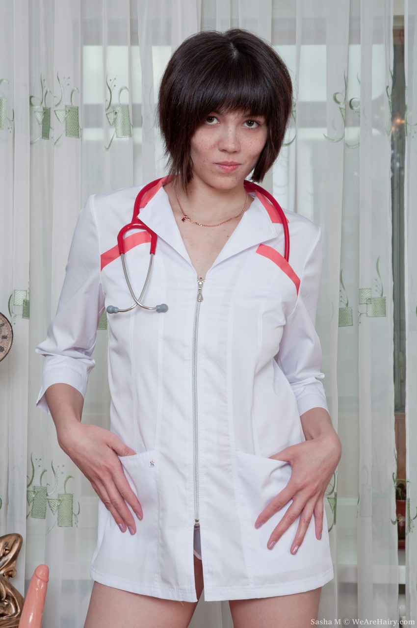 Naturally busty nurse Sasha M shed uniform to reveal big tits & toy hairy twat porn photo #424031390