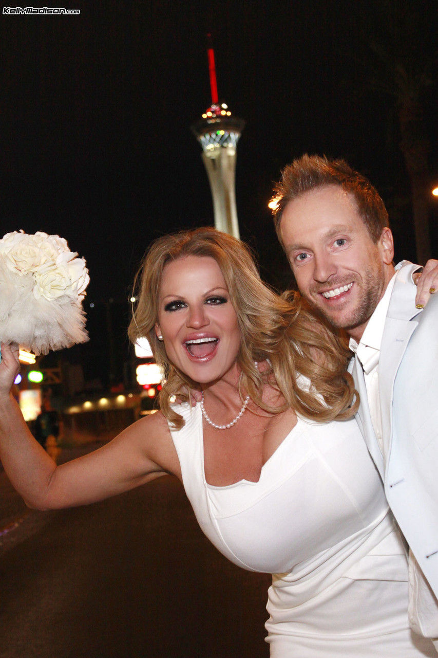 Big boobed chick Kelly Madison jerks off her husband on their wedding night porn photo #427187016