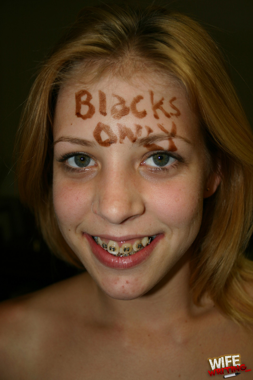 Young blonde slut Leah Luv wraps her braces adorned mouth around a black cock porn photo #422628750