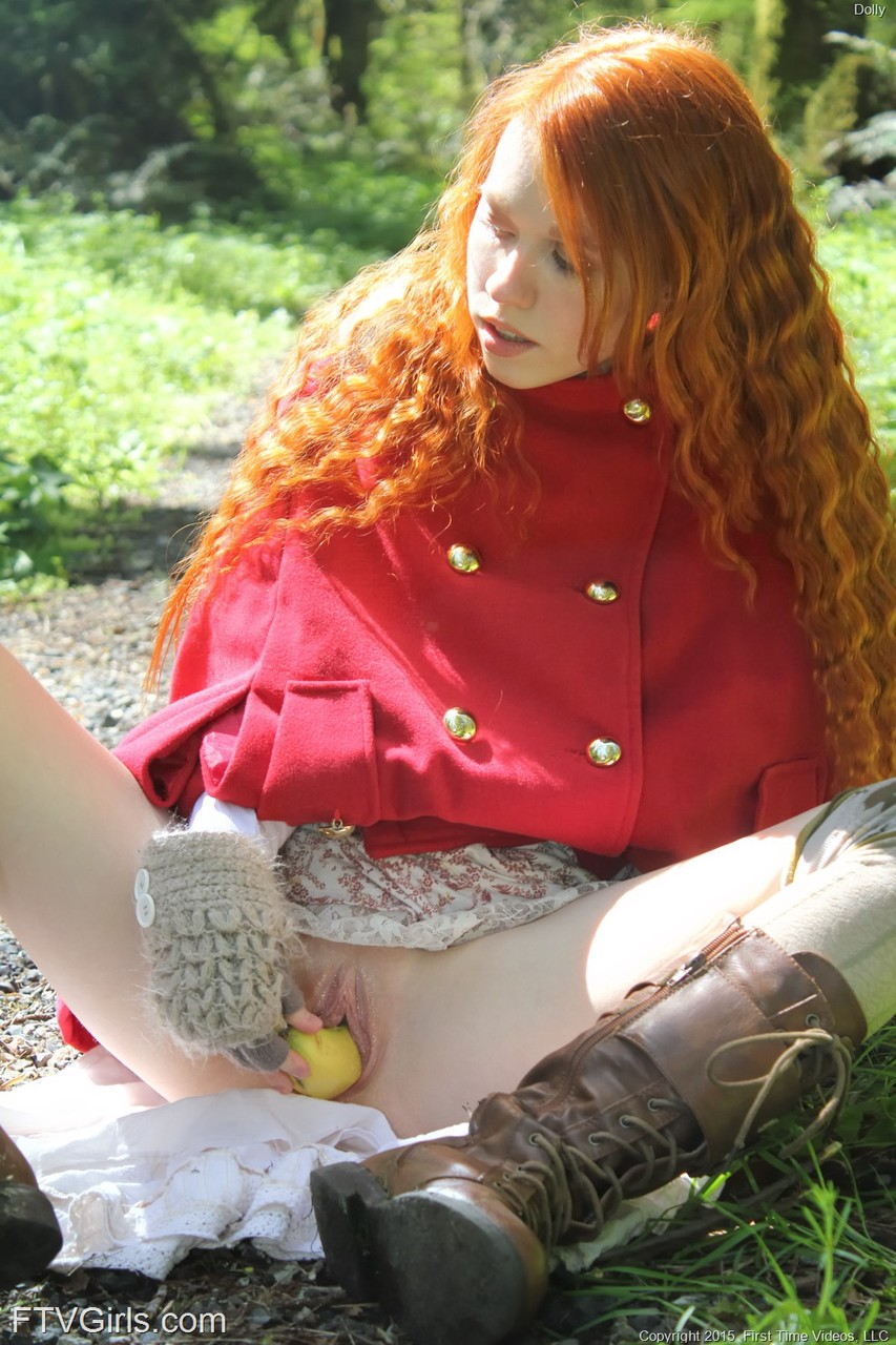 Tiny redhead teen Dolly enjoys solo masturbation with bananas in the forest porn photo #425376417