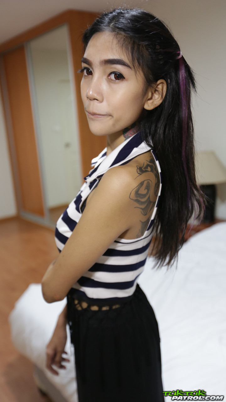 Skinny Tattoo Tits - Skinny Thai girl with tattoos and braces makes her nude modelling debut -  PornPics.com