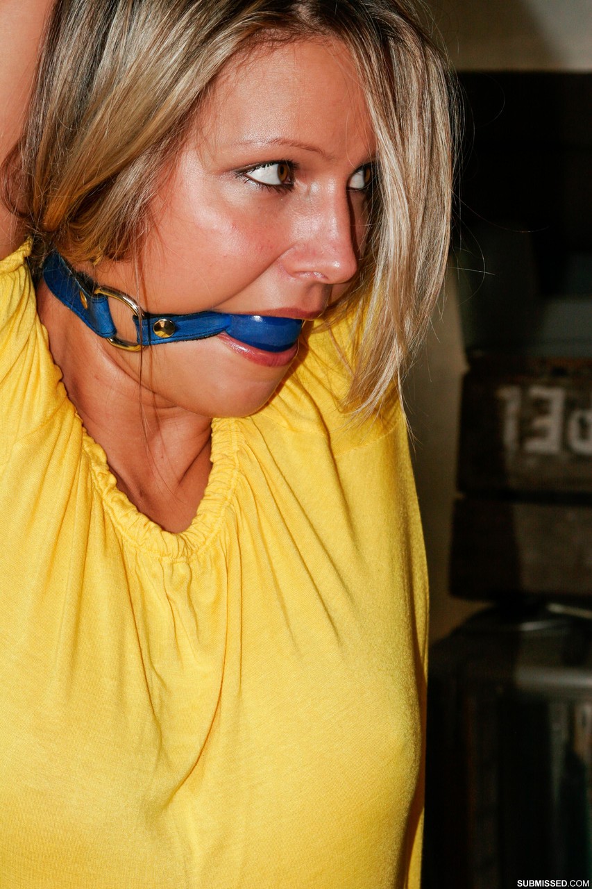 Tied up girl Samantha with ball gag in mouth is a property of dominant man porn photo #424909653