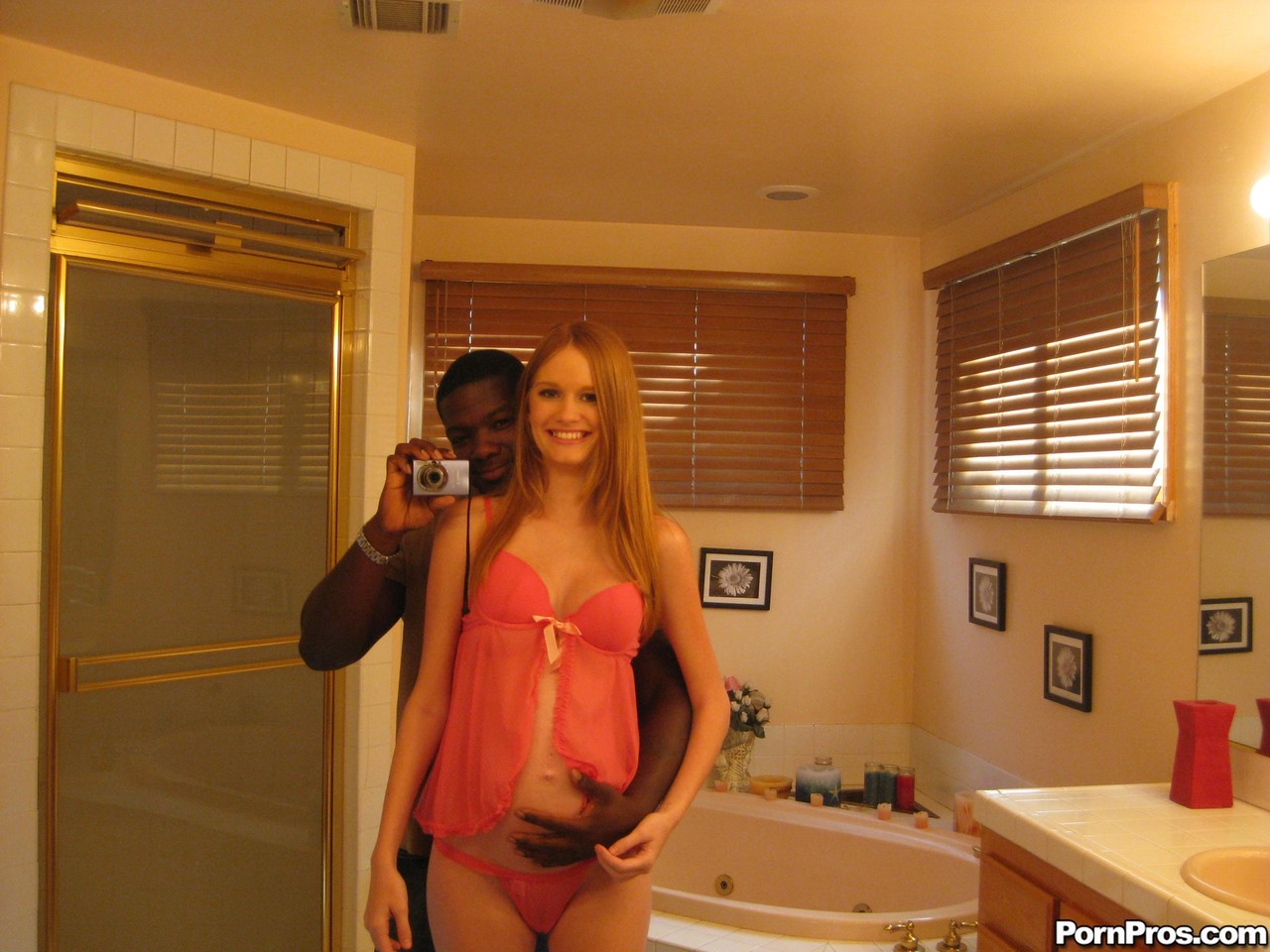 Pregnant redhead Layla Exx poses for the photoshoot with black guy porn photo #428844075
